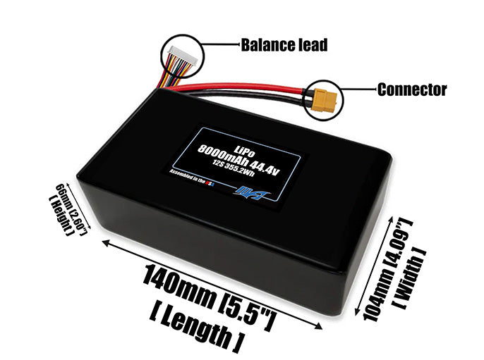 Size reference photo of the 8000mAh lite 44.4V side by side LiPo pack showing 140 mm by 104 mm by 66 mm dimensions ideal for drones or robotic systems where space matters.