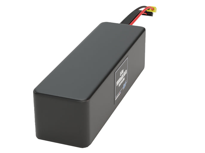 Side-angle render of a 50.4-volt 18000mAh lithium-ion battery, assembled in the USA for compact UAV, drone, and military robotics platforms.